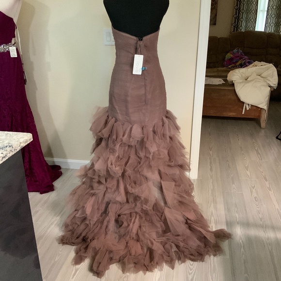 Ruffles and ruching with slight train. - Picture 5 of 12